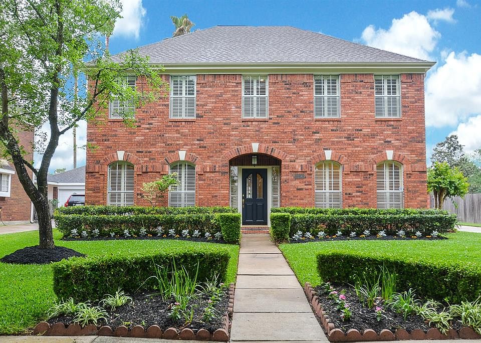 Elegant updated 2-story on quiet & beautiful tree-lined street with no back neighbors.