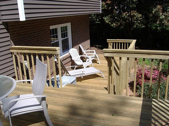 Enjoy the view of your private, wooded, & fenced back yard.