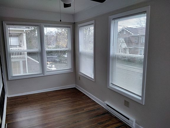 Enclosed front porch looking west.