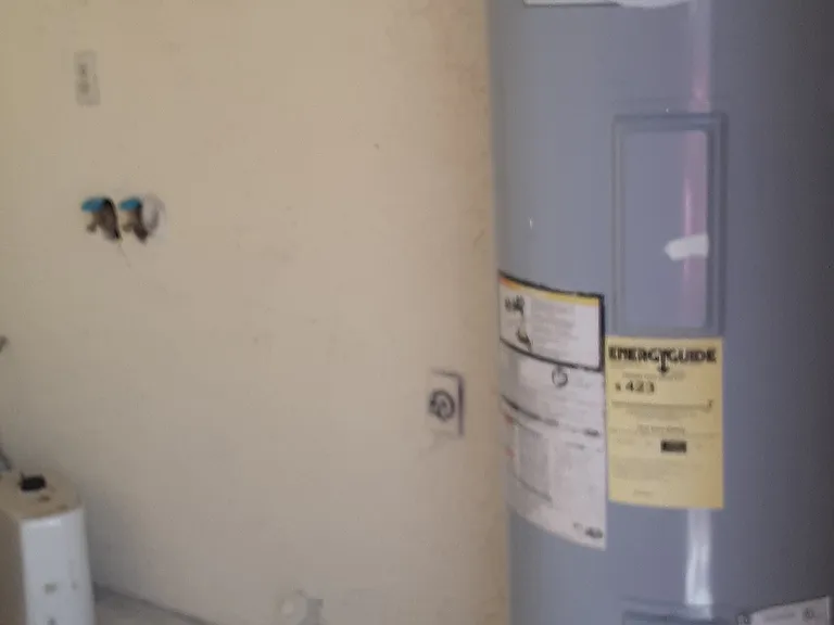 Down stairs laundry room with washer/dryer hook-up.