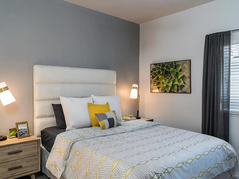 King-Size Bedroom Featuring Neutral Tones and Modern Nightstands