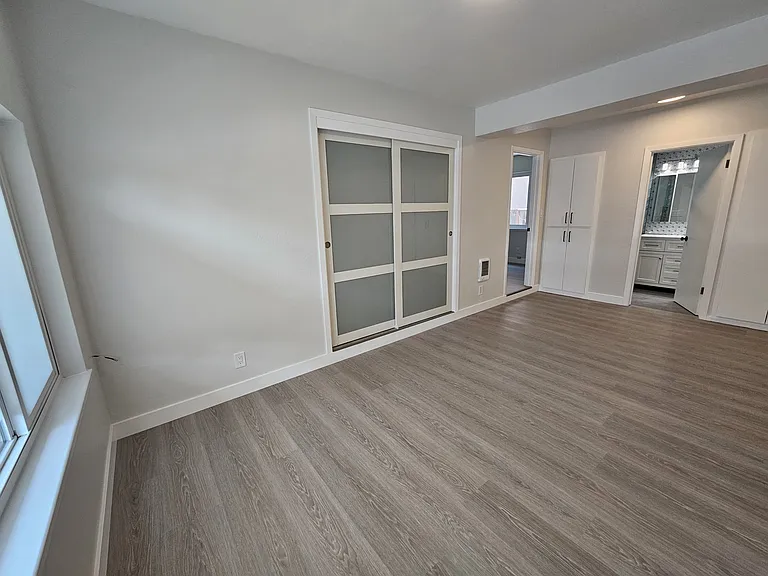 Primary suite with large closets and new bathroom.