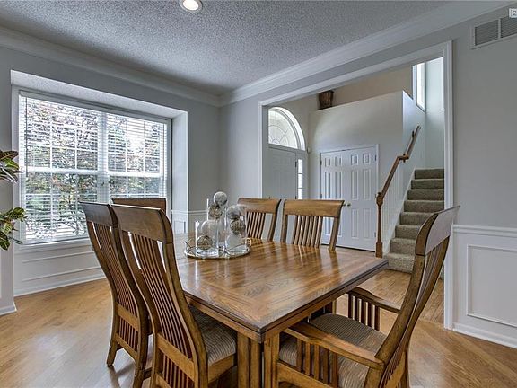 Large Dining Room w/Gleaming Hardwood Floors!  View into Foyer!