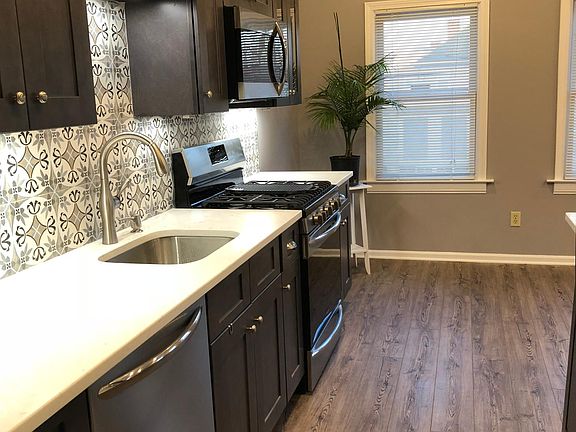 Brand New Kitchen with Stainless Steel Appliances and Quartz