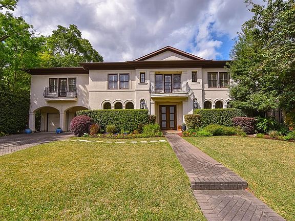 The brick paver driveway has lots of space for additional off street parking for guests.