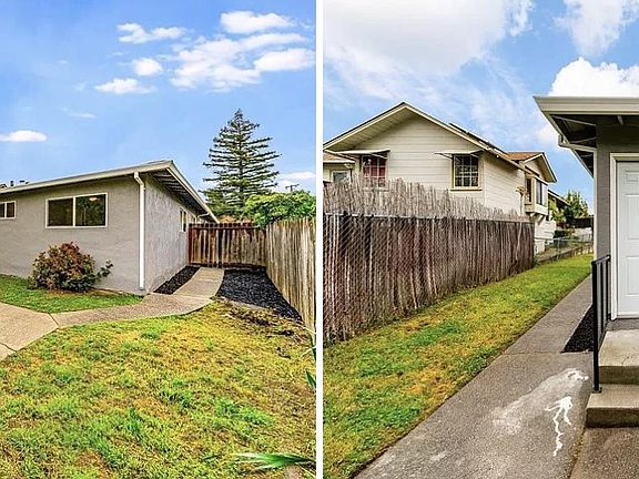 Backyard and patio and back door leading to kitchen