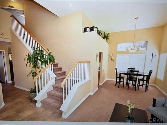 Entryway, living room , dining room stairwell to second floor