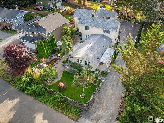 Drone Shot of Both Homes>