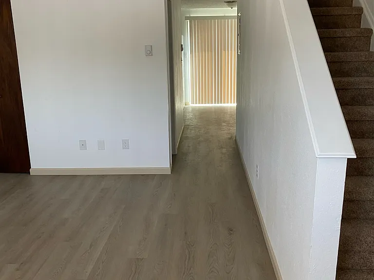 Hall way from front entrance to kitchen