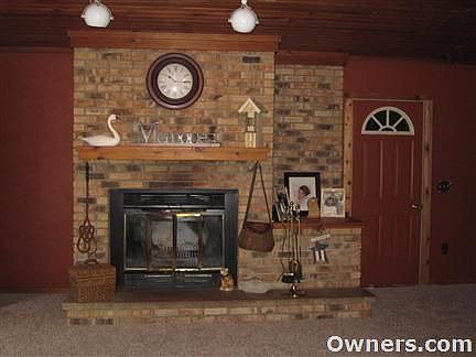 Warm and cozy spacious Family room with brick fireplace