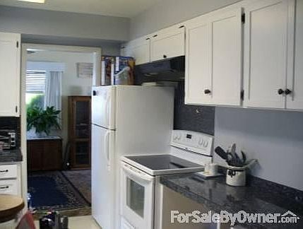 Updated Kitchen
						:
						Granite Tiles all the way around kitchen. Nice glass topped stove.