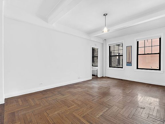 3rd image of 141 E 3rd St APT 3A