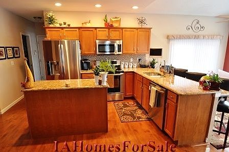 Kitchen - New Granite Countertops, Backsplash, Stainless Sink in late 2011.  All New LG Stainless Appliances in early 2012