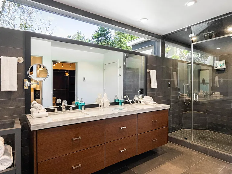 Lavish ensuite bathroom, seamlessly connected to the master bedroom for an exhilarating experience.