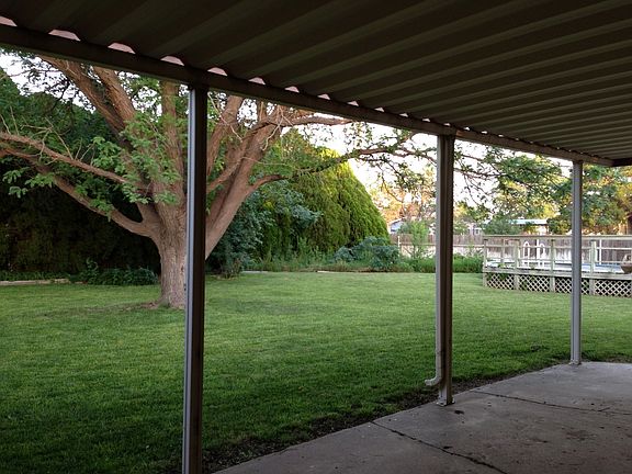 Covered patio and backyard