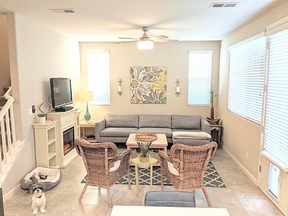 Living room includes wiring to mount your tv on the wall and two surround sound speakers. Back door has a dog door that both large and small dogs and cats can use.