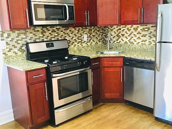 Granite counters, dw, micro-hood, maple floors Not shown is additional counter space