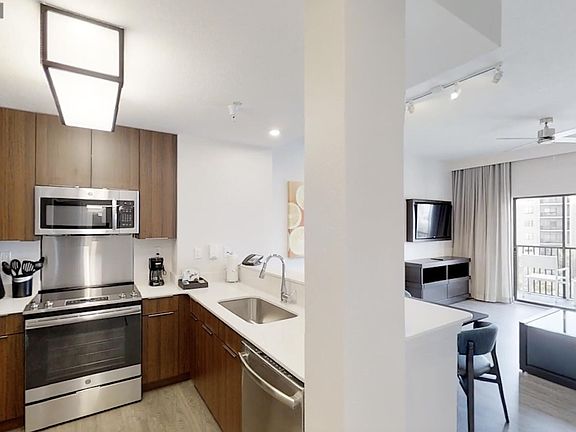 3rd image of 14501 Grove Resort Avenue #3330