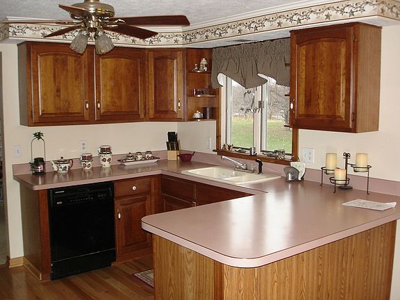 Updated kitchen with gleaming wood floors