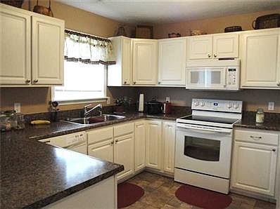 Kitchen. New countertops, sink & stove.