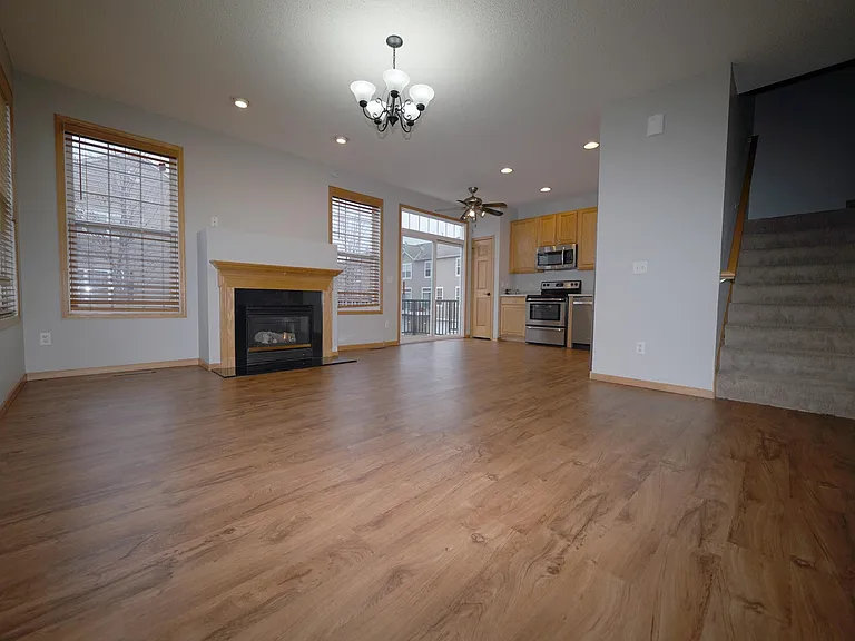 Large eat-in kitchen with fireplace and new flooring