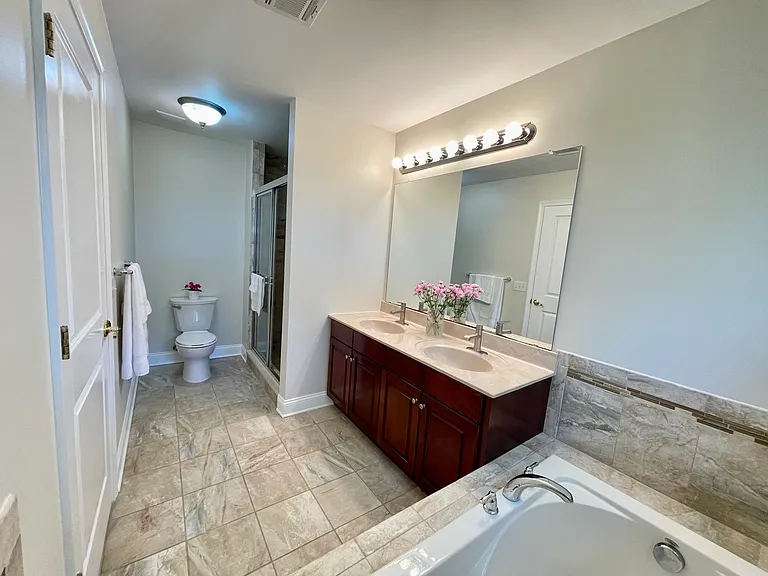 Beautifully appointed primary bath offering a relaxing retreat