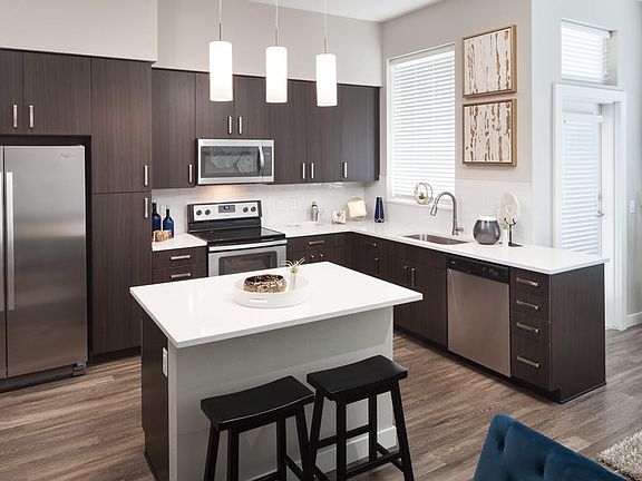 kitchen with island at Griffis Cherry Creek North apartments in Denver