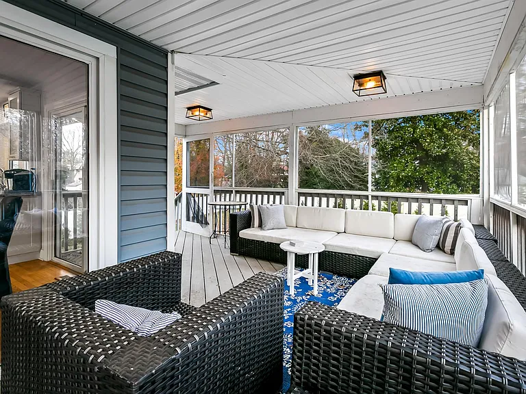 Screened in porch also has an uncovered grilling area right off of the kitchen!