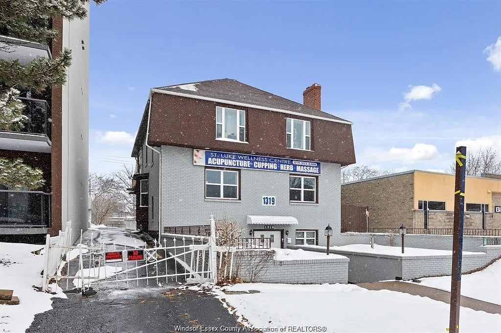 Building Photo - 1319 Ouellette Ave #MAIN