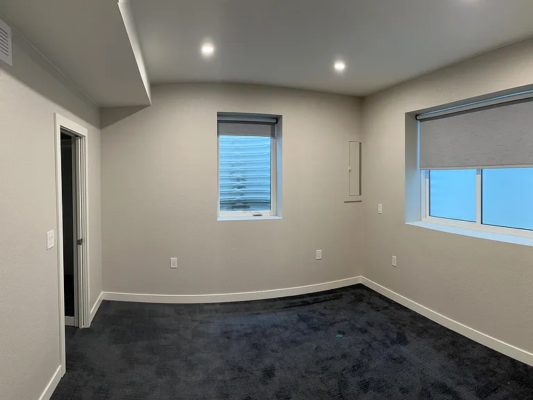 Master Bedroom big enough for a king bed and nightstands, w room for a dresser. The walk-thru closet has a washer and dryer.