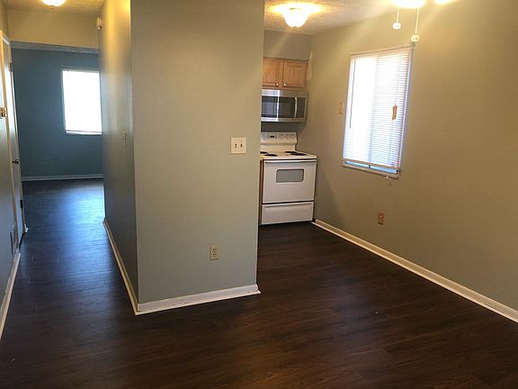 Kitchen to the right and hallway to the living room