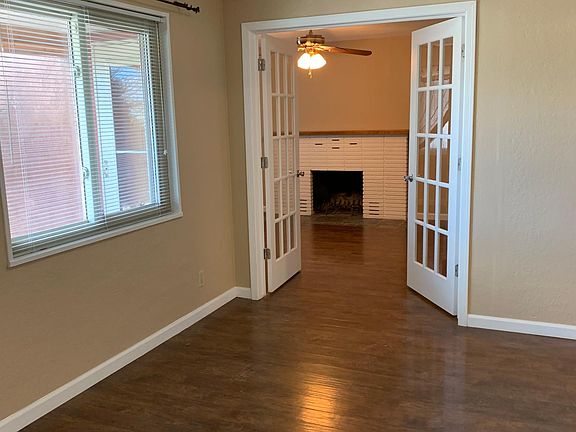 French doors into bonus room off of living area