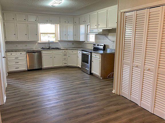Kitchen with laundry area