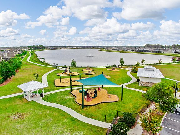 Walking path around the lake- Beautiful during sunset and sunrise. Kids playground, picnic tables