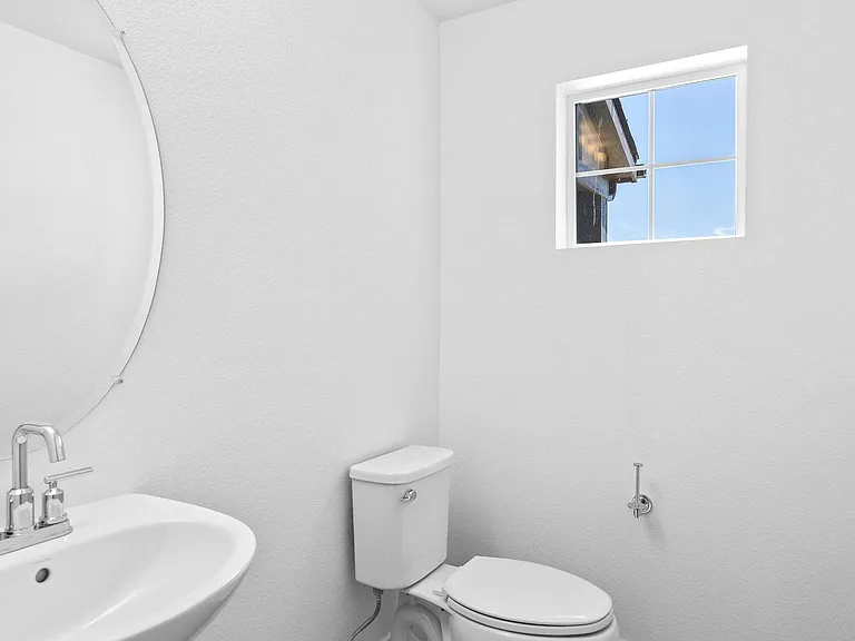 Powder Room just steps away from Living & Dining Area