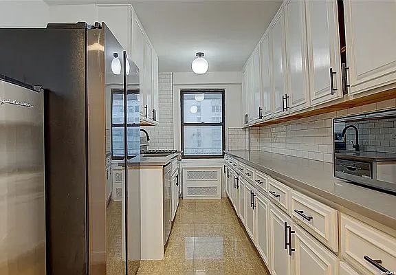 5th image of 12340 83rd Ave APT 3H