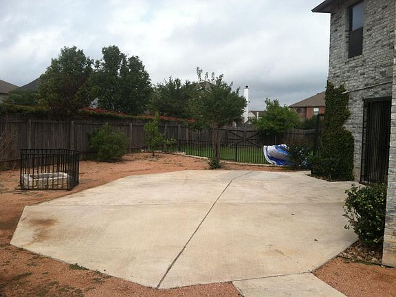 Spacious backyard with fire pit