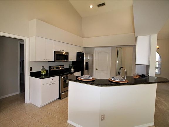 4th image of 8485 Island Palm Cir