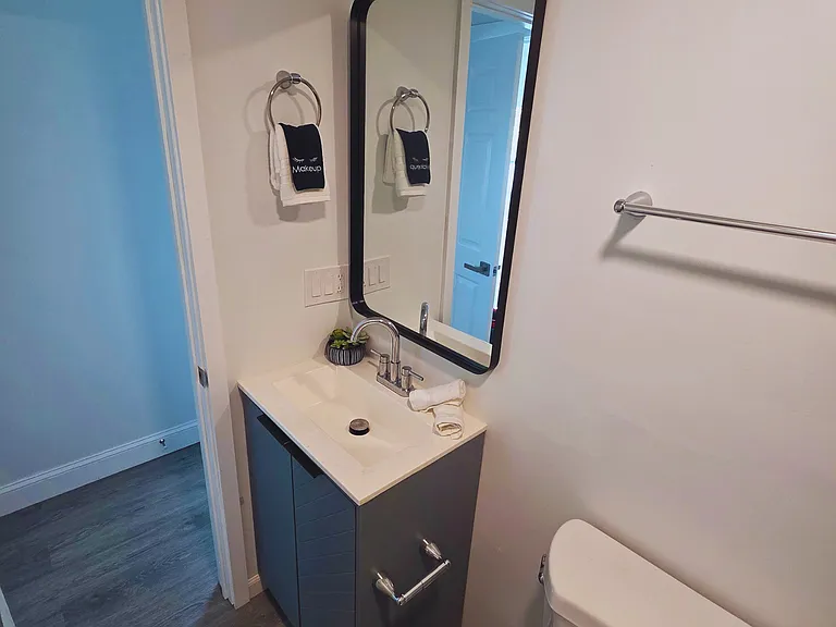 Includes a cabinet and a cozy mirror for your convenience.