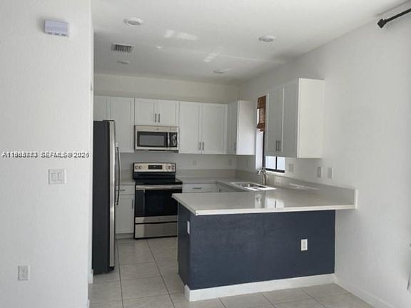5th image of 3380 W 108th St #Townhouse 3380