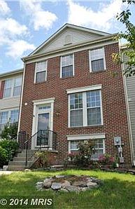 Full Brick Front. English Basement Model