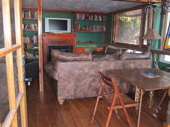 Entrance through french doors into dining/living area
