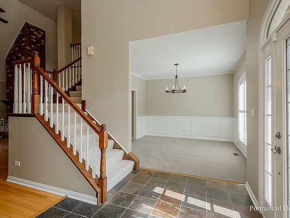 2-story foyer with slate flooring