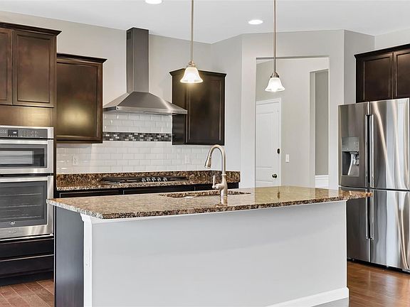 Kitchen with Granite Countertops and Gas Cooktop