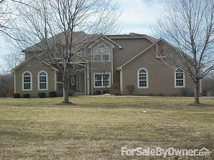 Beautiful Two Story Home on 3 acres
						:
						Located in Lees Summit School Dist.
Front of home is stucco