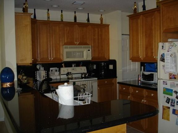 Upgraded Kitchen with Granite Counters, Wood Cabinets