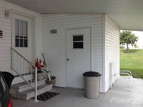 Storage Shed Entrance and Entrance to Home