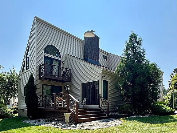 Back of house facing the lak