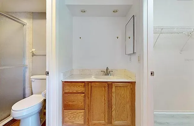 Master bathroom with walk in closet