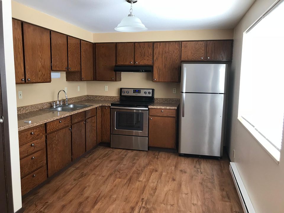 Spacious kitchen with new appliances, countertops. Includes dishwasher and disposal